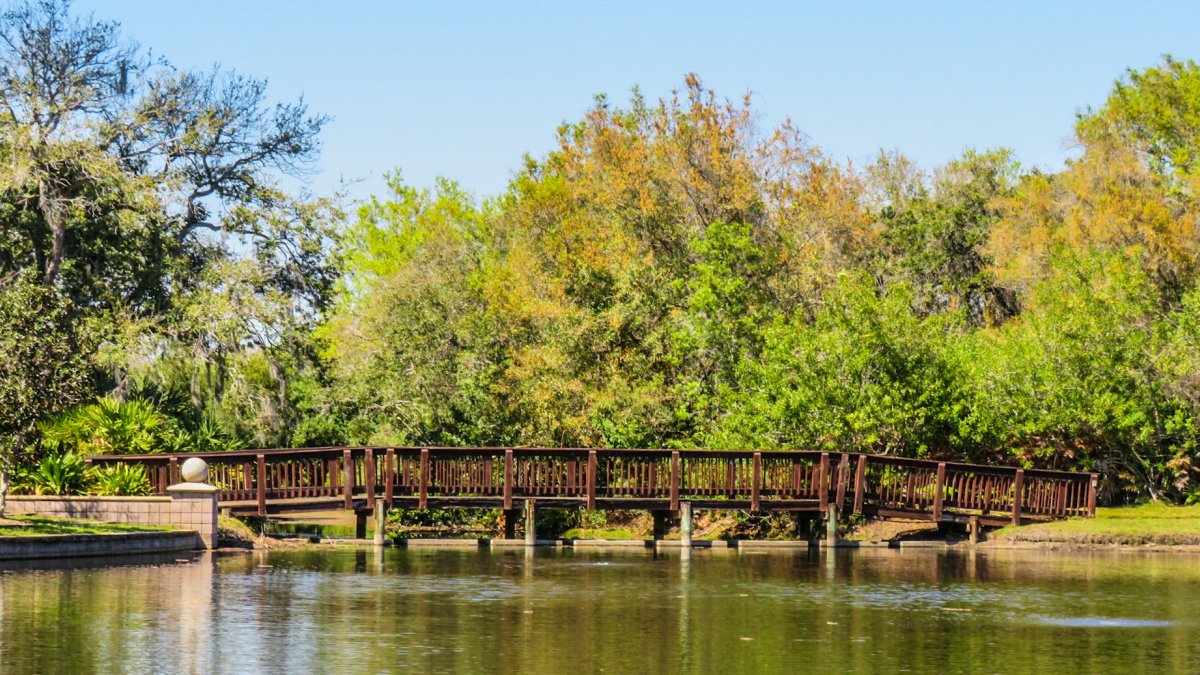 A boardwalk along a small lake in the Carillon Wildlife Habitat Conservation Area.