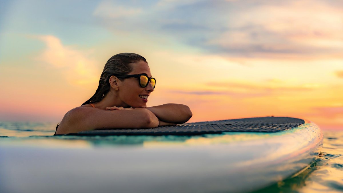 A woman on a paddleboard in the water