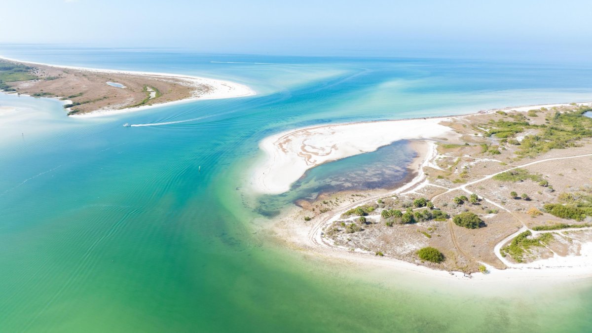 Aerial view of Honeymoon Island State Park with Caladesi Island in the background.