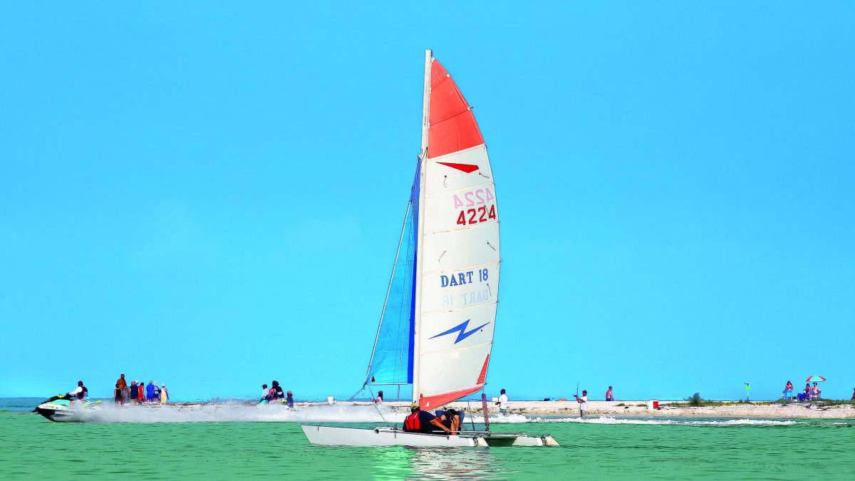 Catamaran sailing off Honeymoon Island