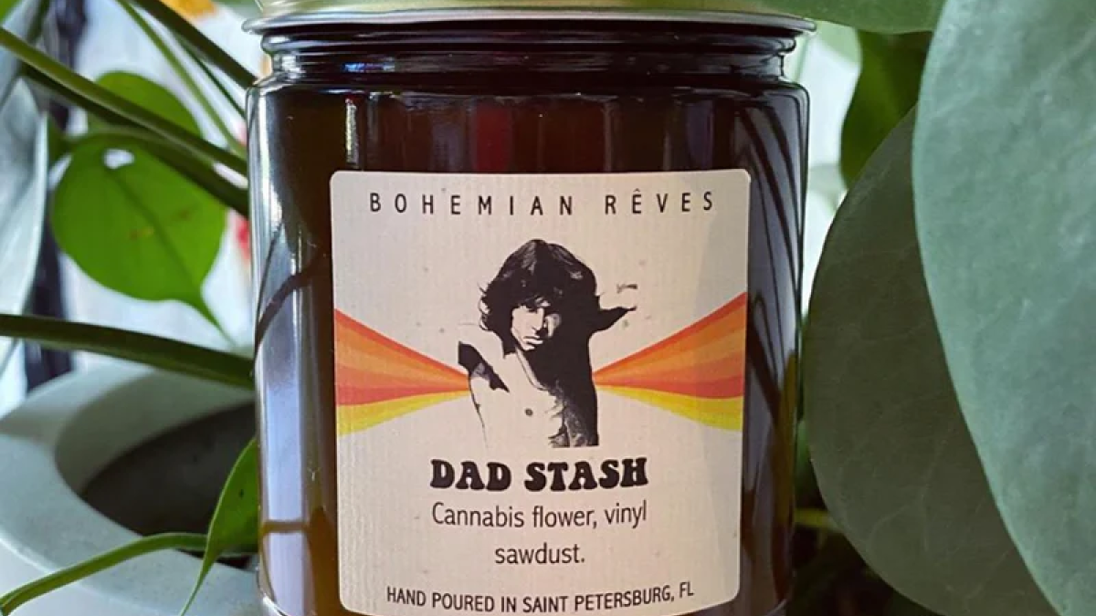 Jar candle with label that says Dad Stash