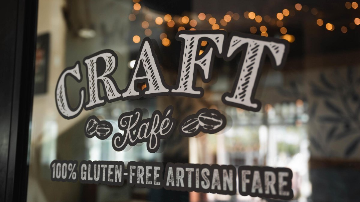 Sign for Craft Kafe painted on window