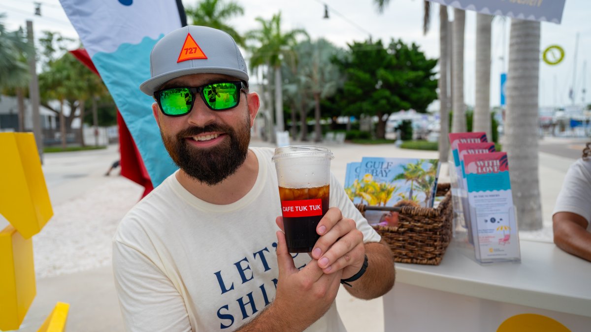 Man holding a coffee