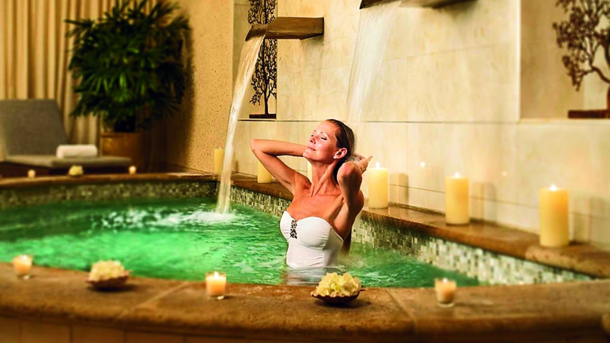 Woman relaxing in a spa jacuzzi