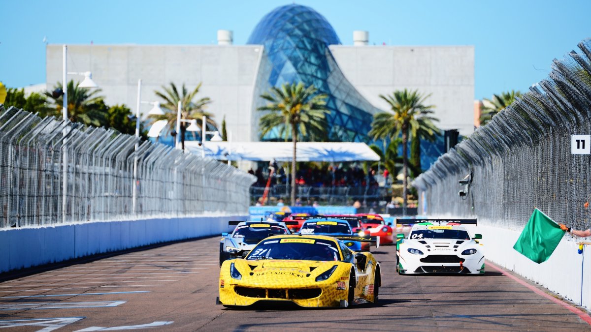 Firestone Grand Prix car races in front of the Dali Museum