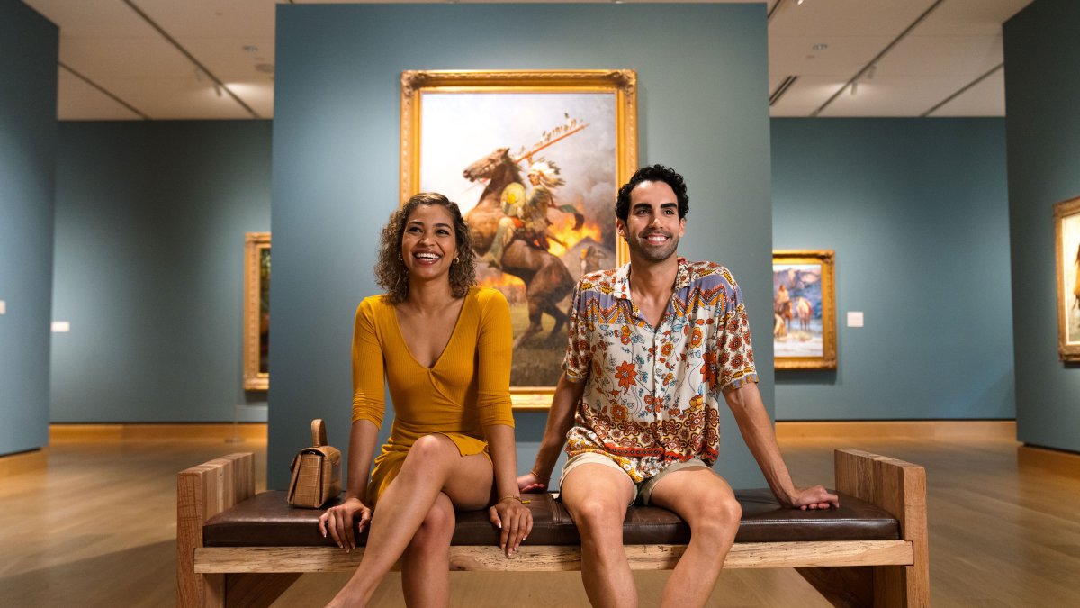 Two people sit at the James Museum