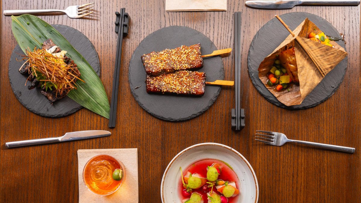 Plates of various Asian fusion dishes