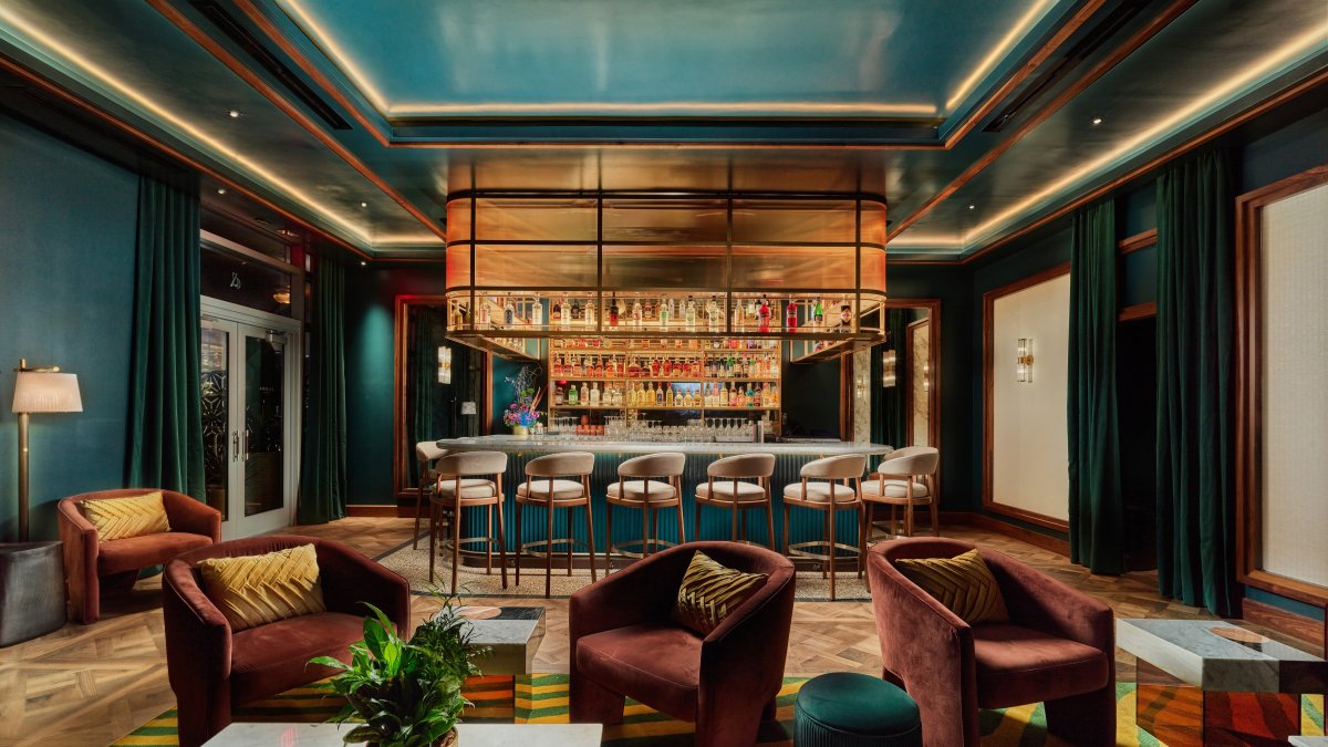 a stylish cocktail lounge decorated in rich jewel tones
