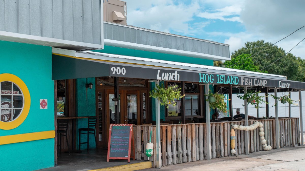 the rustic exterior of Hog Island Fish Camp restaurant in Dunedin