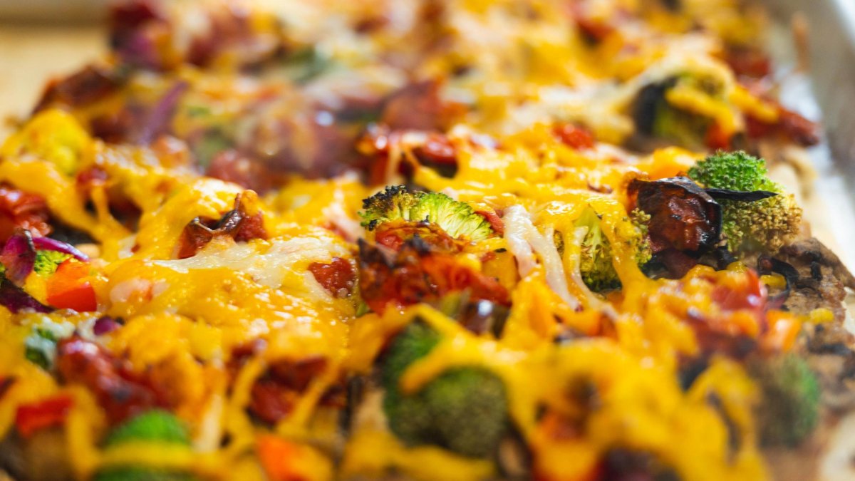 a close up of a square slice of pizza at Craft Kafe