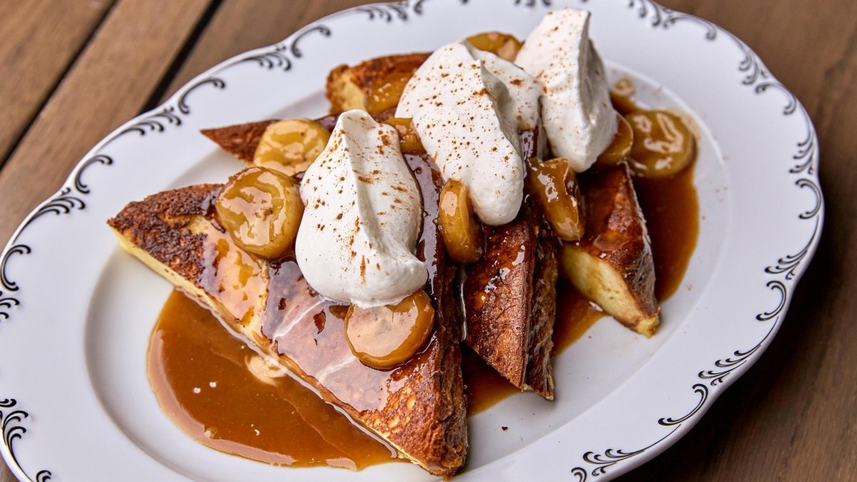 french toast with bananas, buttered rum sauce and whipped cream at Elliott Aster at the Vinoy Hotel