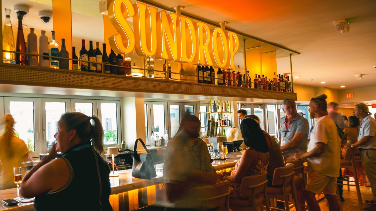 People having drinks at the bar at Sundrop