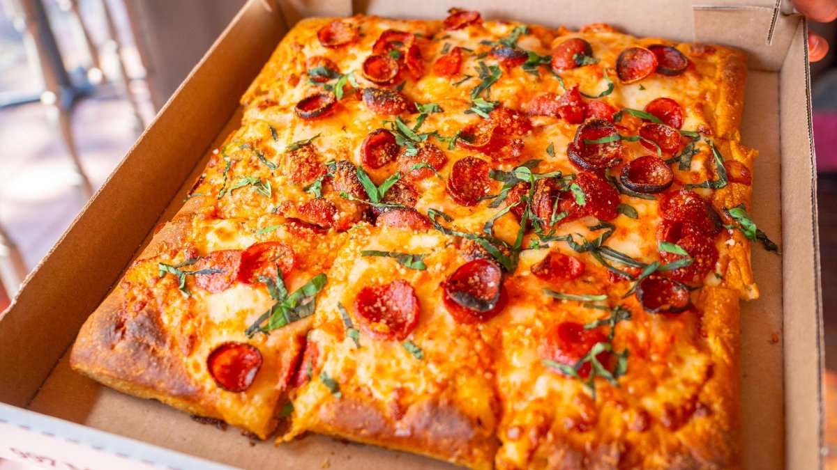 a thick-crust square pepperoni pizza in a box from Nona Slice House in Safety Harbor