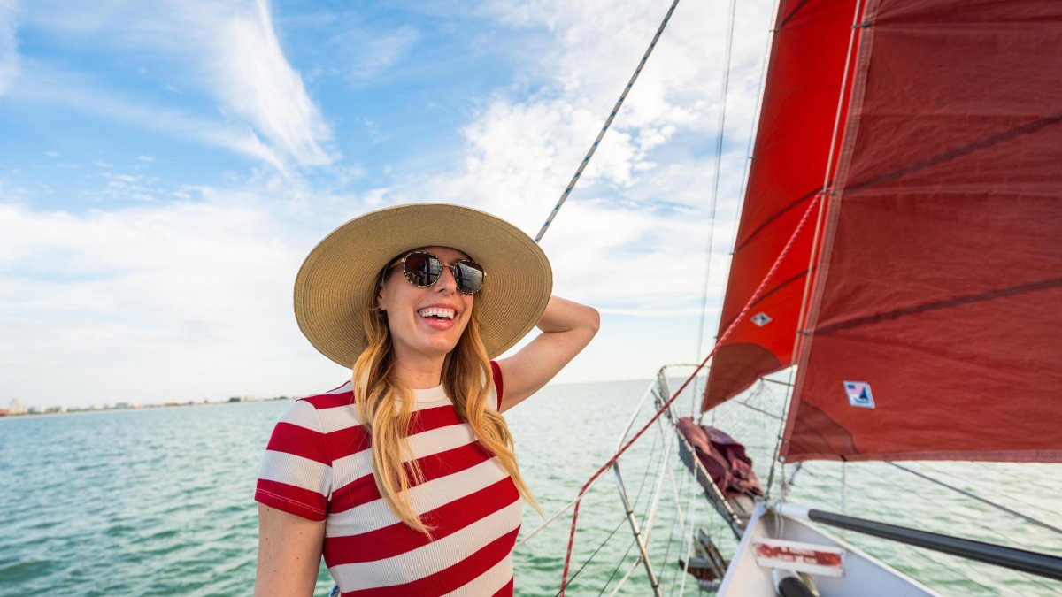 a young woman at the bow of a day cruise with Suncoast Sailing in Treasure Island