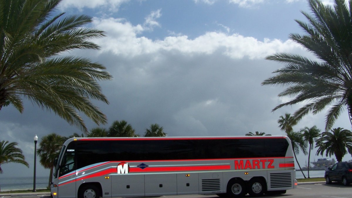 55 passenger motor coach with DVD, WiFi, Lavatory, Storage Bays & much more