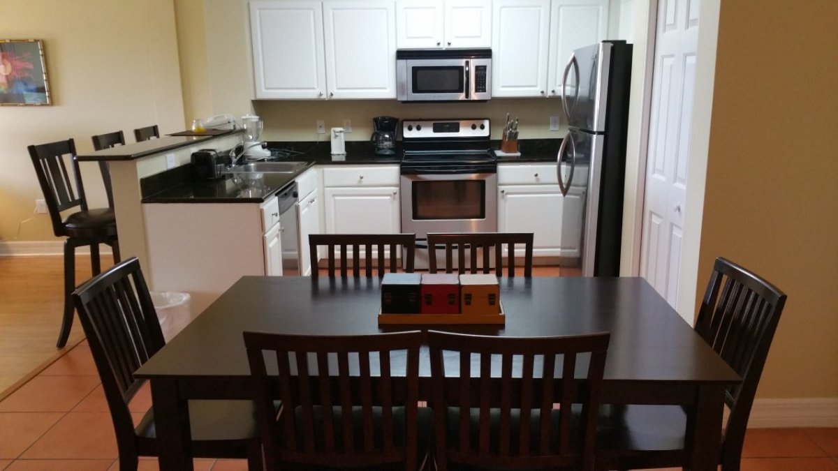 Dining room and kitchen in two bedroom condo at Madeira Bay Resort