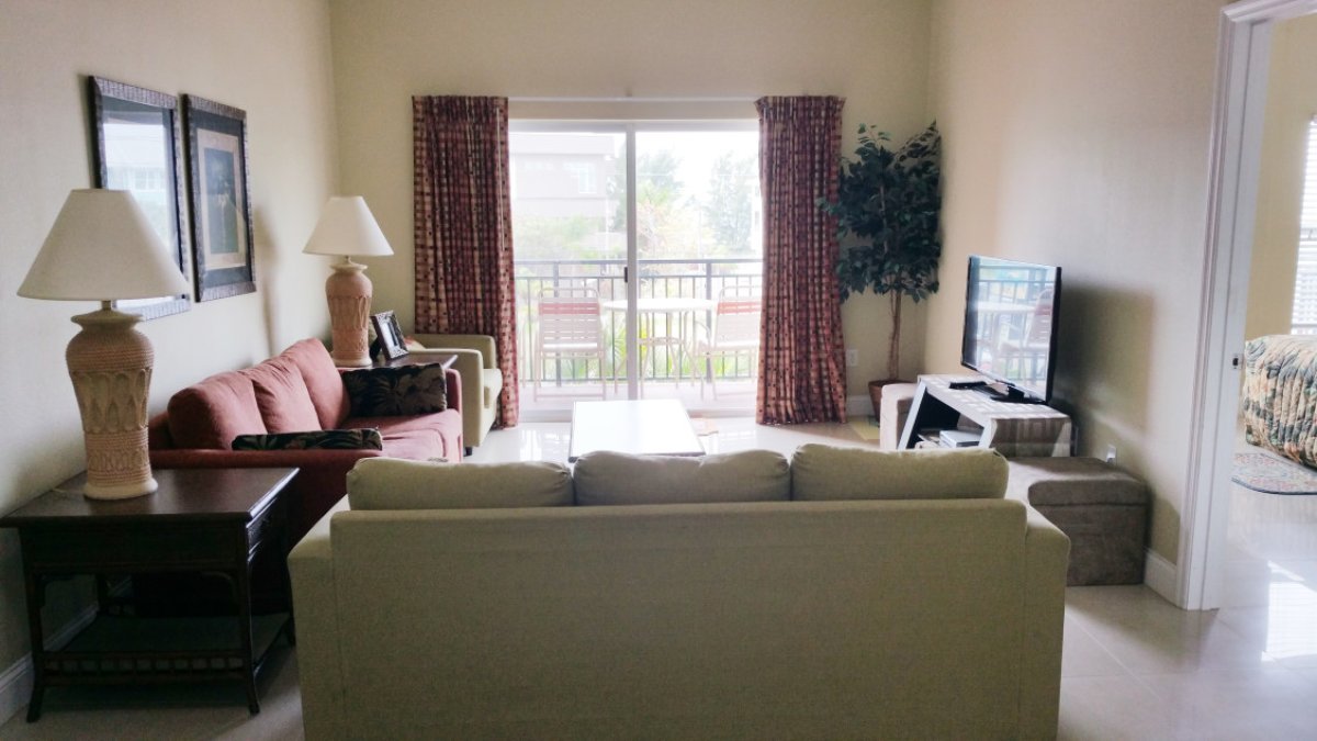 Living room of one bedroom condo at Madeira Bay Resort by TRS