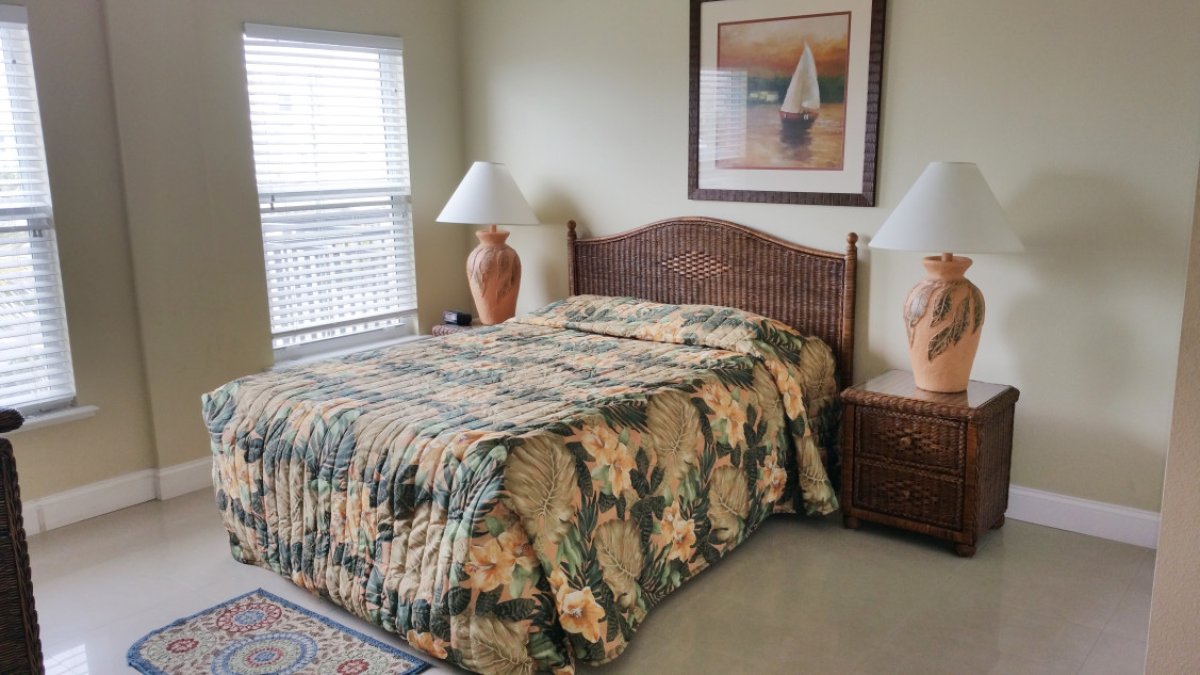 Master bedroom of one bedroom condo at Madeira Bay Resort
