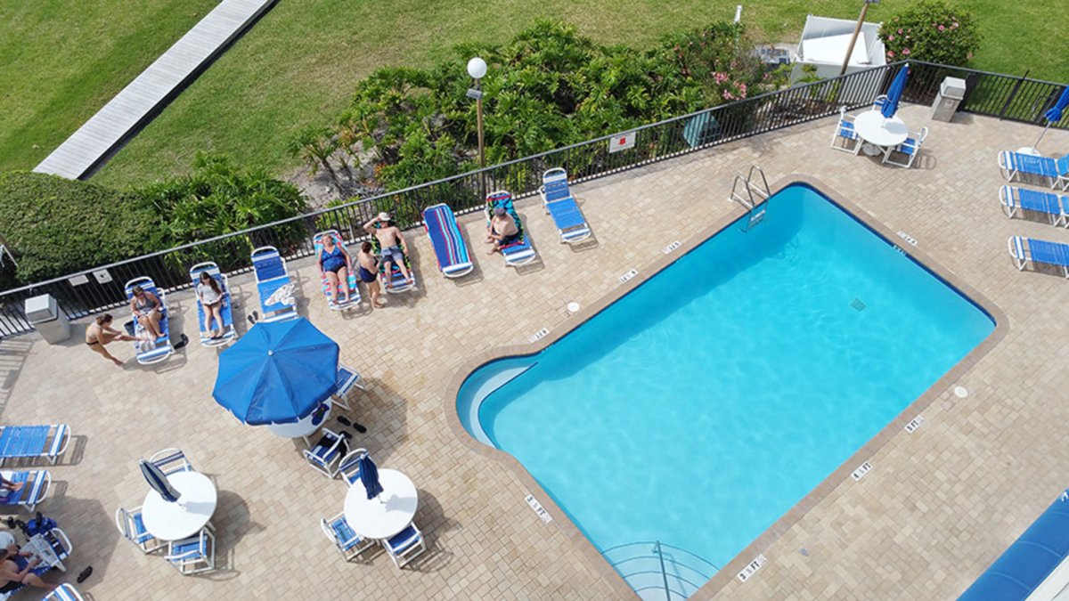 View of pool at The Caprice on St. Pete Beach - TRS-Travel Resort Services