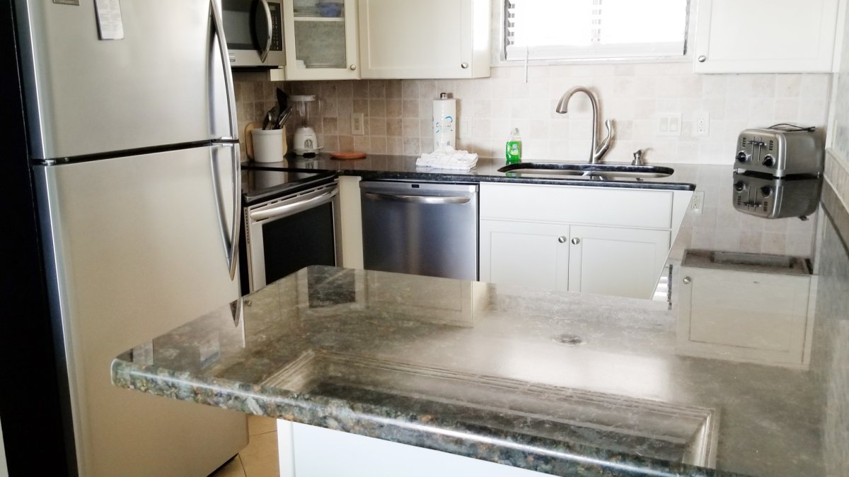 Kitchen of a two bedroom condo at the Caprice Resort by TRS