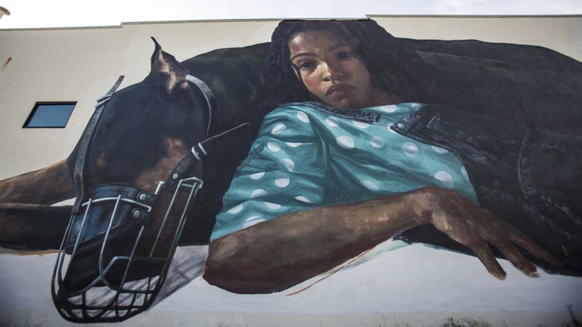 Girl with Doberman