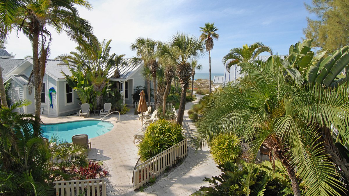 View of property and Gulf from covered patio of 2 bedroom suite