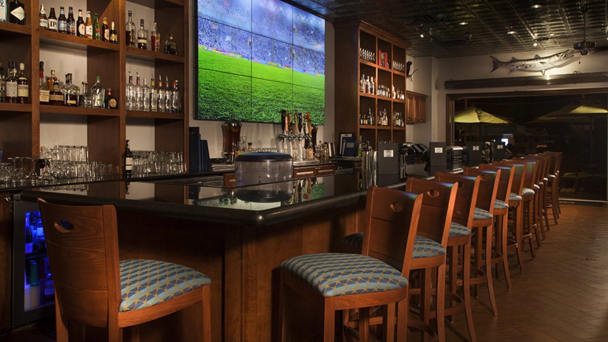 Catch the game on our 14 foot TV screen in the indoor bar