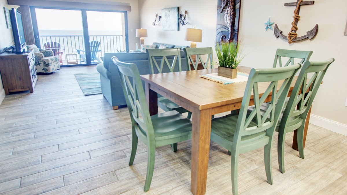 Dining room in Gulf front vacation condo by TRS-Travel Resort Services