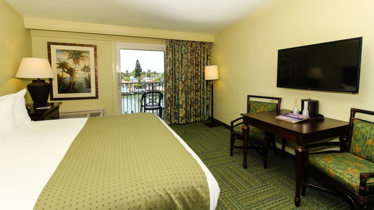 A King Bedded Marina View Room with the most comfortable bed on the beach