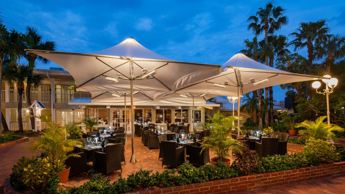 The Palm Court Terrace overlooks the lush tropical landscaping of the 6000 sq ft. Garden Court Yard.