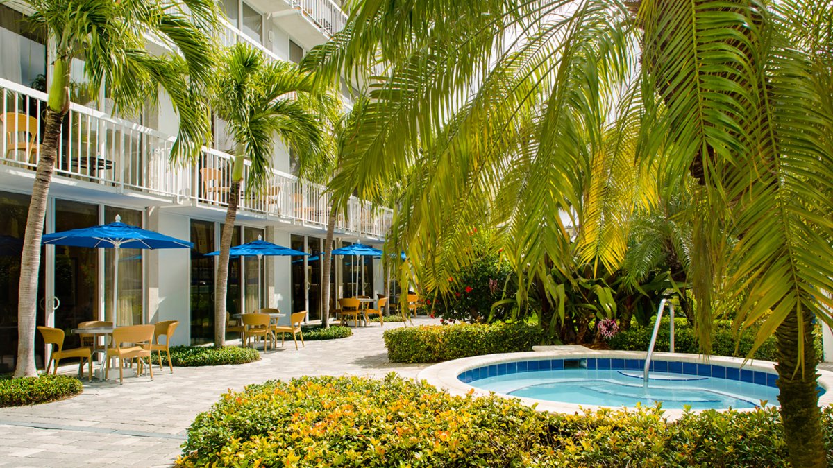 Relax in the Oasis Courtyard with adult-only pool and whirlpool.