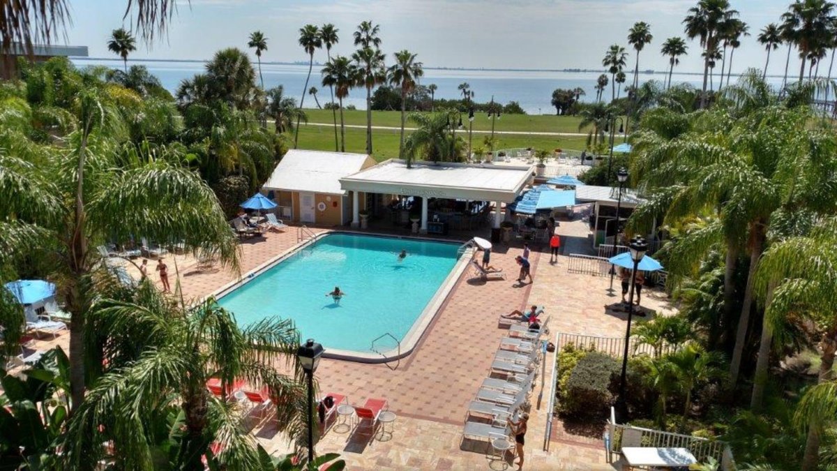 Tropical oasis pool and tiki bar