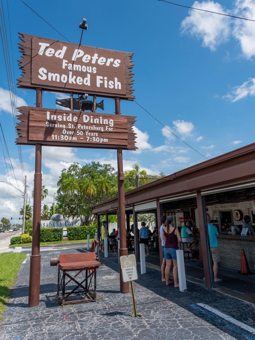 Ted Peters restaurant with sign and open-air dining room