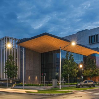 An exterior shot of the Museum of the American Arts and Crafts Movement at night