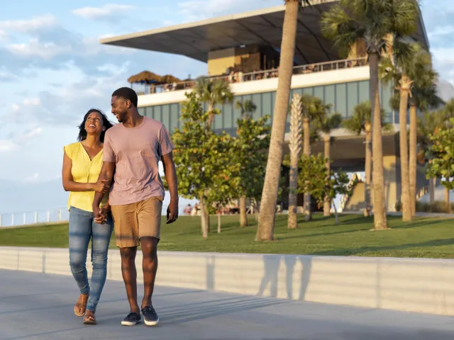 Couple walks on St. Pete Pier