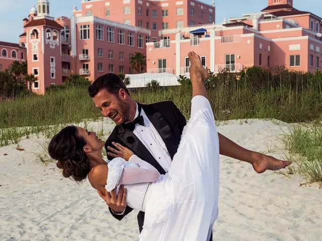 Couple on beach in front of Don Cesar
