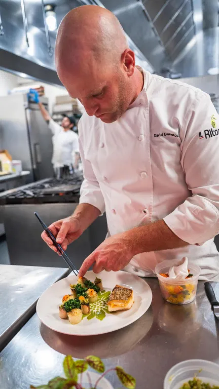 Chef David Benstock puts the finishing touches on a dish at Il Ritorno in St. Pete